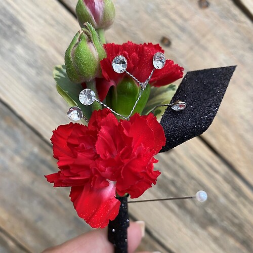 The Ruby Boutonniere